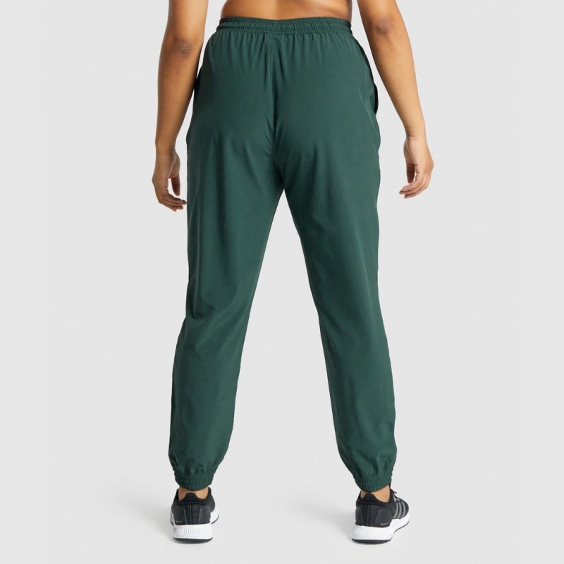 παντελονι jogger Gymshark Αθλητικά Woven σκούρο πρασινο | 204AGMYUK